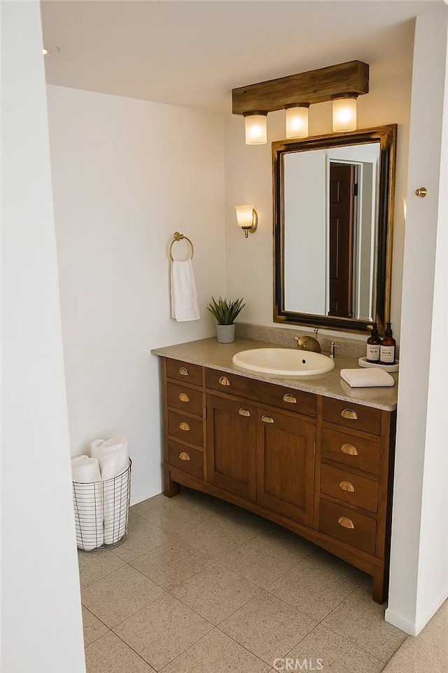 1111 S Coast Dr Unit 18, Costa Mesa, CA 92626 - bathroom featuring vanity and baseboards