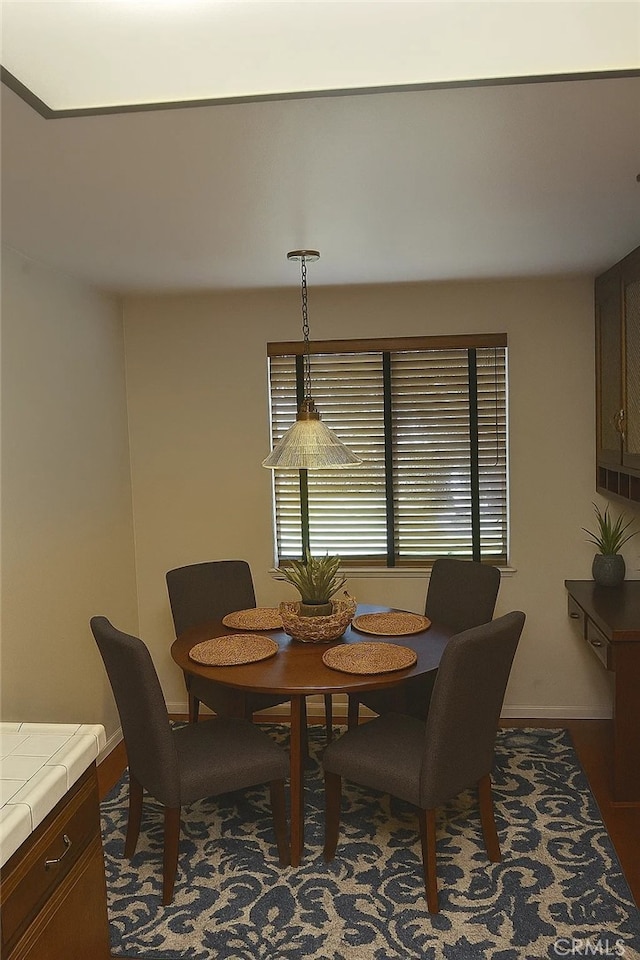 1111 S Coast Dr Unit 18, Costa Mesa, CA 92626 - dining space with baseboards