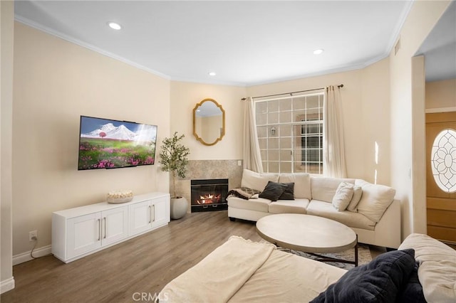 2256 Montrose Ave Unit 14, Montrose, CA 91020 - living room featuring crown molding, recessed lighting, a glass covered fireplace, and wood finished floors