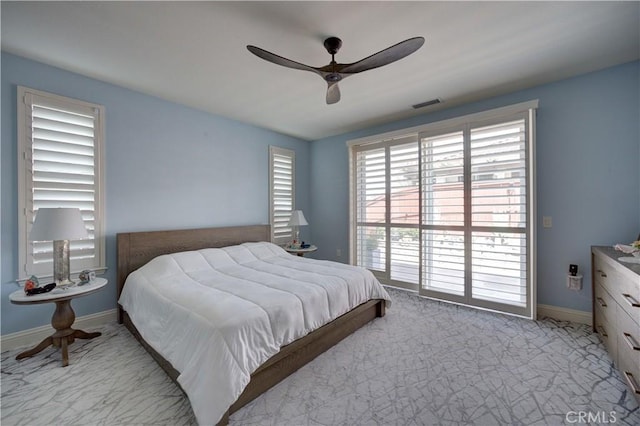 bedroom with ceiling fan, carpet flooring, baseboards, and visible vents