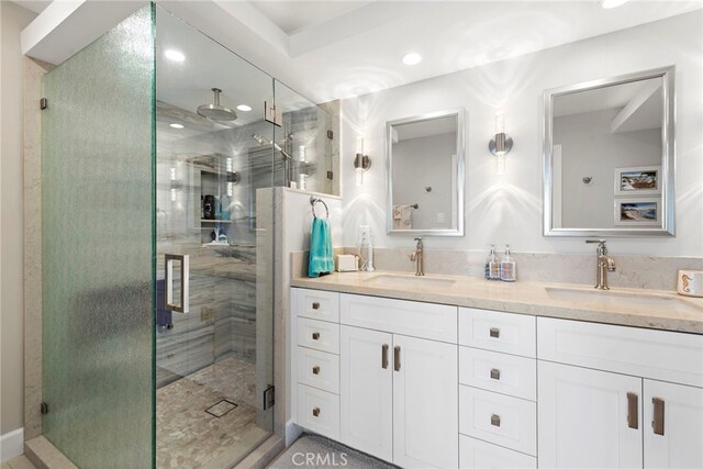 1001 Buena Vis Unit 2, San Clemente, CA 92672 - bathroom with a shower stall, recessed lighting, double vanity, and a sink