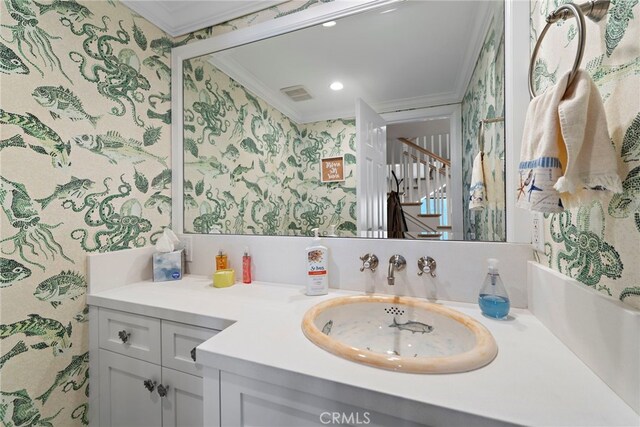 1001 Buena Vis Unit 2, San Clemente, CA 92672 - bathroom with vanity, crown molding, wallpapered walls, and visible vents