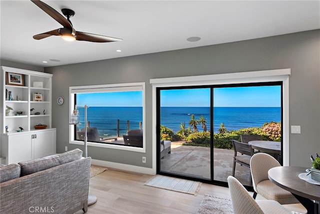 1001 Buena Vis Unit 2, San Clemente, CA 92672 - living room with baseboards, light wood-style floors, a water view, and ceiling fan