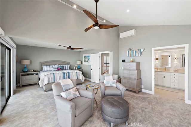 1001 Buena Vis Unit 2, San Clemente, CA 92672 - bedroom with an AC wall unit, ceiling fan, connected bathroom, high vaulted ceiling, and light colored carpet