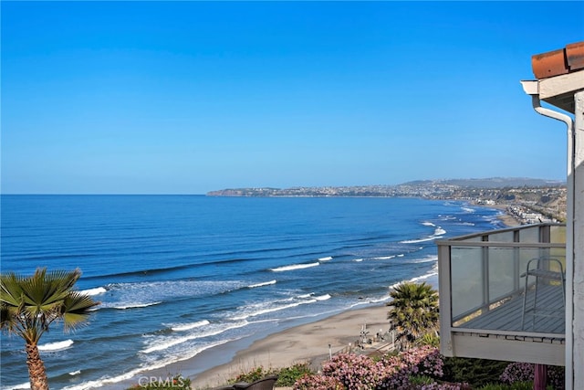 property view of water featuring a beach view