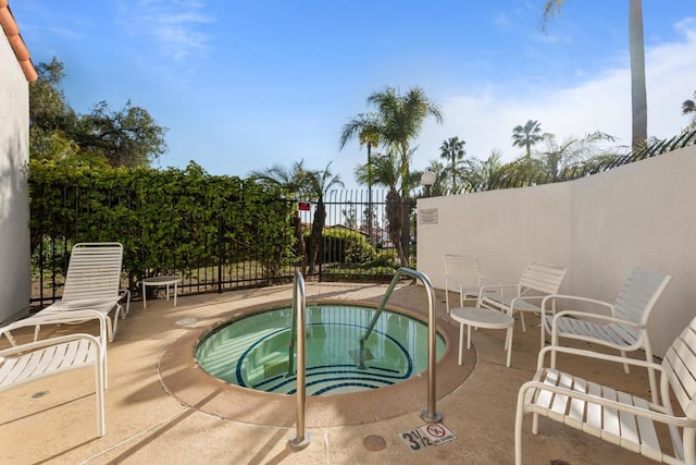 1579 Apache Dr Unit E, Chula Vista, CA 91910 - view of swimming pool featuring a hot tub and a patio area