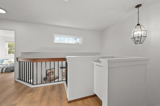 1579 Apache Dr Unit E, Chula Vista, CA 91910 - corridor featuring wood finished floors and baseboards