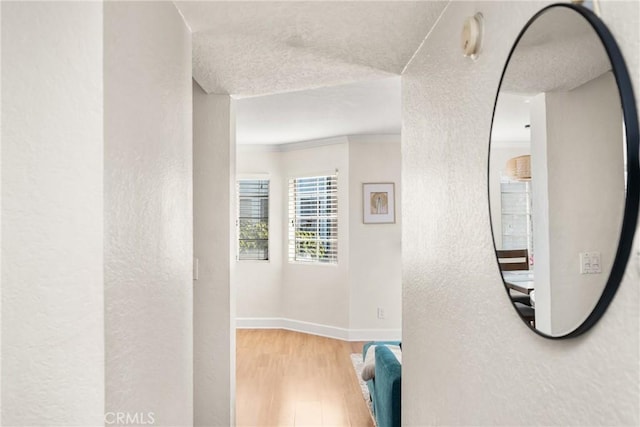 1100 Euclid Ave Unit 103, Long Beach, CA 90804 - hall featuring wood finished floors, baseboards, a textured ceiling, and a textured wall
