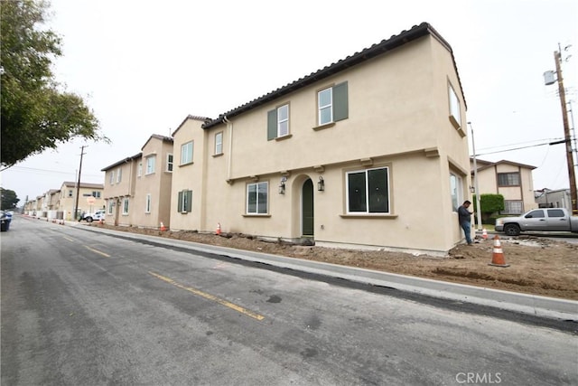 view of front of property featuring stucco siding