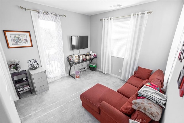 39580 Strada Pozzo, Lake Elsinore, CA 92532 - carpeted living room with baseboards and visible vents