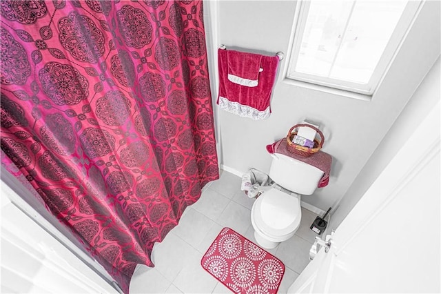 39580 Strada Pozzo, Lake Elsinore, CA 92532 - full bathroom featuring toilet, tile patterned floors, a shower with shower curtain, and baseboards