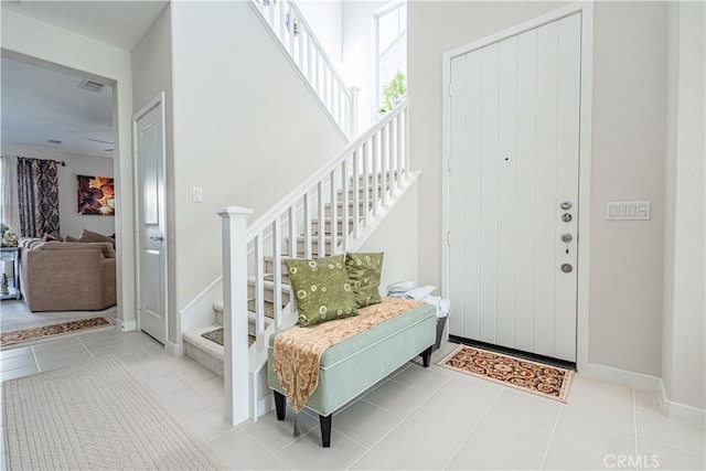 39580 Strada Pozzo, Lake Elsinore, CA 92532 - tiled foyer with baseboards and stairway