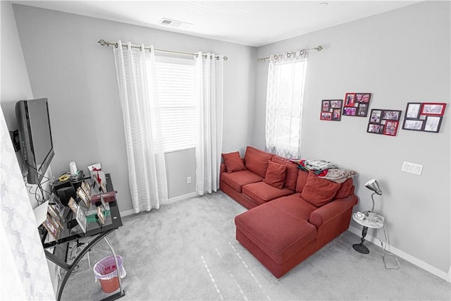 39580 Strada Pozzo, Lake Elsinore, CA 92532 - carpeted living room with visible vents and baseboards