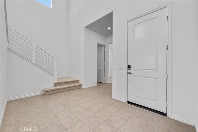 2575 Sierra Bella Dr, Corona, CA 92882 - foyer featuring baseboards and stairway