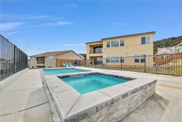 2575 Sierra Bella Dr, Corona, CA 92882 - view of pool with a fenced in pool, a patio area, an in ground hot tub, and fence