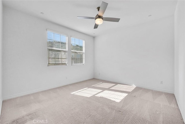 2575 Sierra Bella Dr, Corona, CA 92882 - spare room featuring carpet flooring, baseboards, and ceiling fan