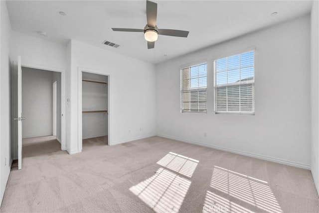 2575 Sierra Bella Dr, Corona, CA 92882 - unfurnished bedroom with visible vents, baseboards, a closet, ceiling fan, and light colored carpet