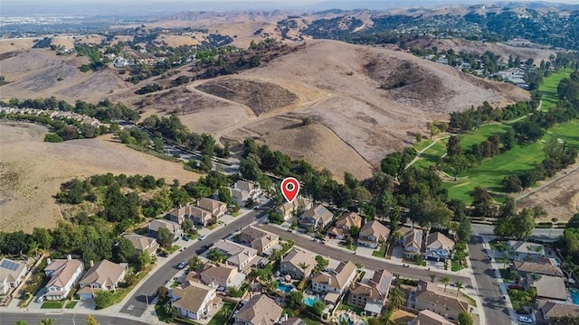 1731 Via Ln, Loma, Chino Hills, CA 91709 - aerial overview of property's location featuring nearby suburban area and a mountainous background