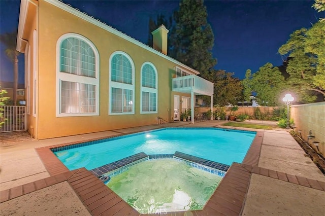 1731 Via Ln, Loma, Chino Hills, CA 91709 - pool at twilight with a pool with connected hot tub, a fenced backyard, and a patio