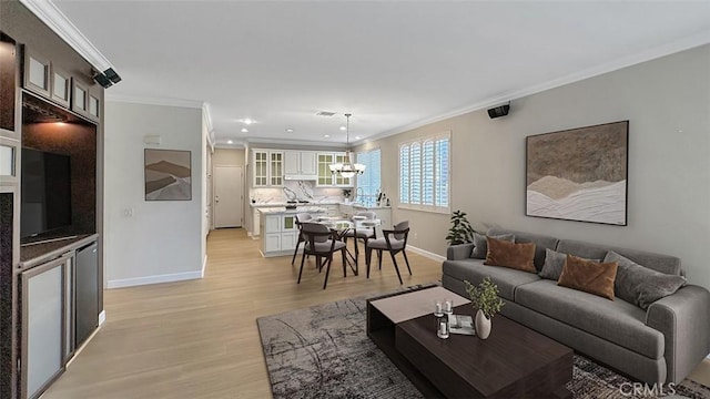 1731 Via Ln, Loma, Chino Hills, CA 91709 - living room with a chandelier, ornamental molding, light wood-style floors, baseboards, and recessed lighting