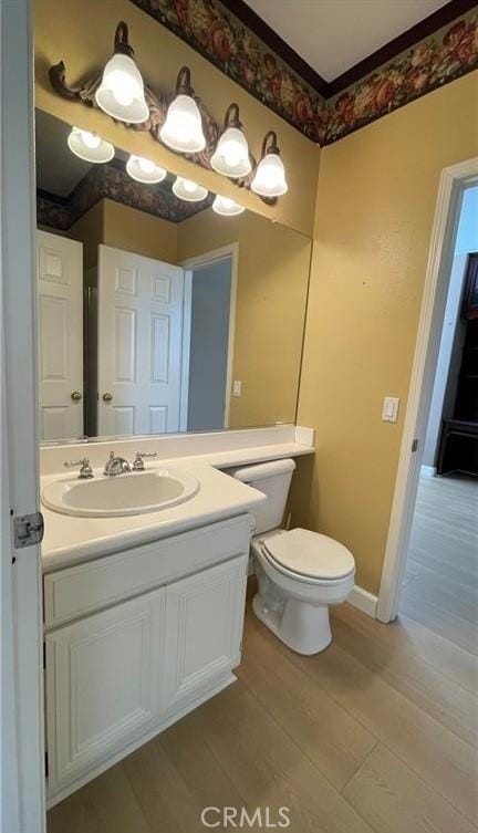1731 Via Ln, Loma, Chino Hills, CA 91709 - bathroom featuring toilet, vanity, wood finished floors, and baseboards