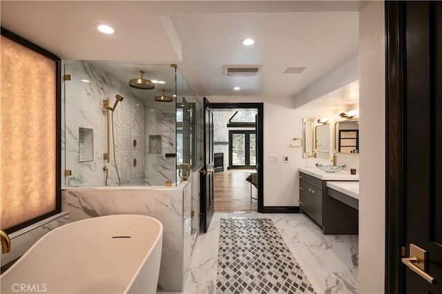 729 Brentwood Dr, Lake Arrowhead, CA 92352 - bathroom featuring vanity, visible vents, marble finish floor, a freestanding bath, and a marble finish shower