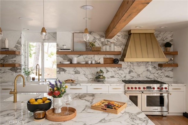 729 Brentwood Dr, Lake Arrowhead, CA 92352 - kitchen featuring open shelves, a sink, double oven range, custom range hood, and backsplash