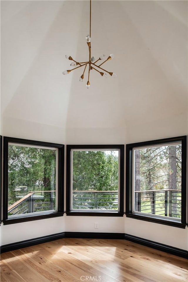 729 Brentwood Dr, Lake Arrowhead, CA 92352 - empty room with a towering ceiling and wood finished floors
