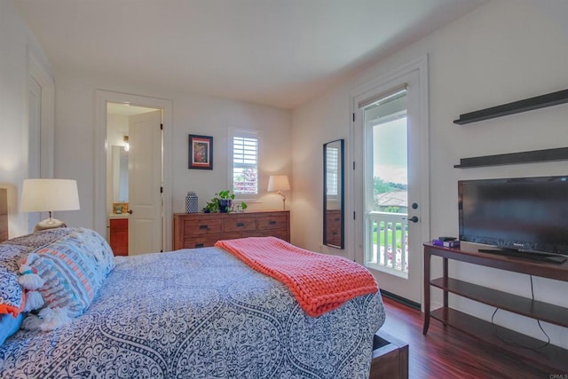 bedroom featuring wood finished floors and access to exterior