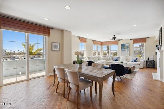 1551 Windshore Way, Oxnard, CA 93035 - dining room featuring ceiling fan, light wood-style flooring, healthy amount of natural light, recessed lighting, and a fireplace