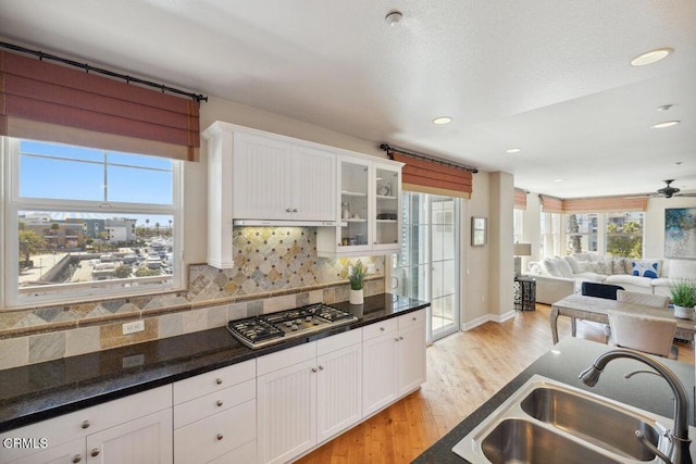 1551 Windshore Way, Oxnard, CA 93035 - kitchen featuring a sink, stainless steel gas cooktop, healthy amount of natural light, decorative backsplash, and recessed lighting
