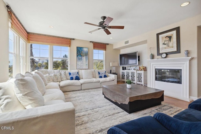 1551 Windshore Way, Oxnard, CA 93035 - living area with ceiling fan, wood finished floors, and recessed lighting