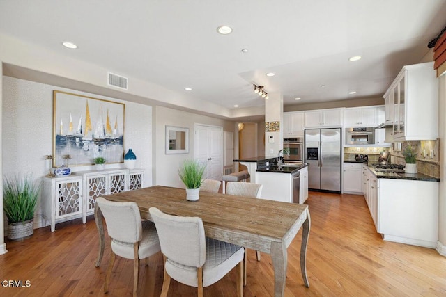 1551 Windshore Way, Oxnard, CA 93035 - dining space featuring light wood-style flooring and recessed lighting