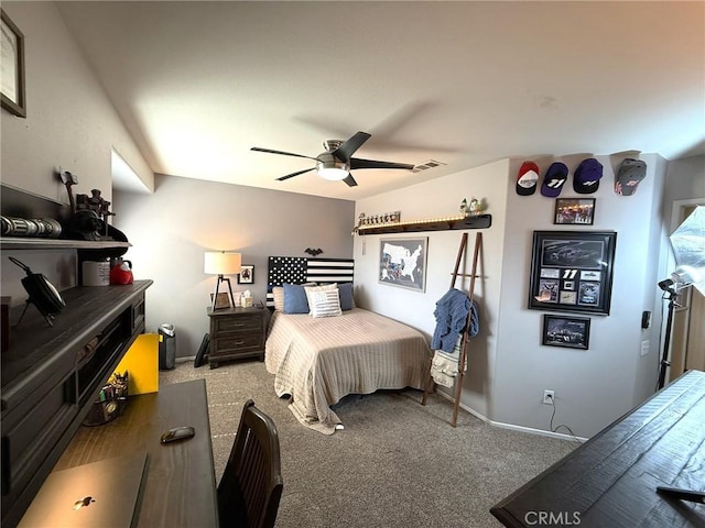 carpeted bedroom featuring a ceiling fan and baseboards