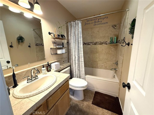 bathroom featuring shower / bath combo with shower curtain, toilet, and vanity