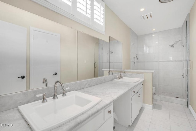 625 S Orange Grove Blvd Unit 3, Pasadena, CA 91105 - full bathroom featuring a sink, visible vents, toilet, and a shower stall