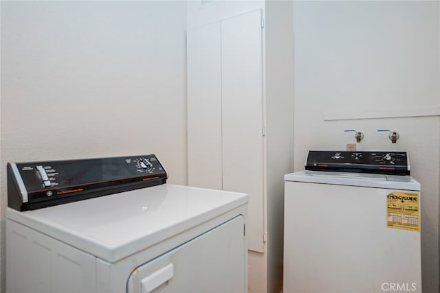 laundry area featuring washer and dryer