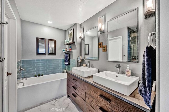 98 Hinterland Way, Ladera Ranch, CA 92694 - full bathroom with a sink, a bath, double vanity, and marble finish floor