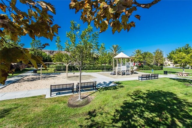 98 Hinterland Way, Ladera Ranch, CA 92694 - view of community featuring a yard and playground community