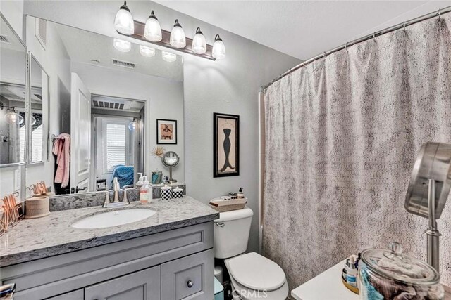 98 Hinterland Way, Ladera Ranch, CA 92694 - full bathroom with toilet, vanity, and visible vents