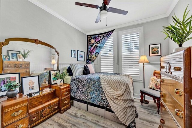 98 Hinterland Way, Ladera Ranch, CA 92694 - bedroom with ornamental molding, ceiling fan, wainscoting, and wood finished floors