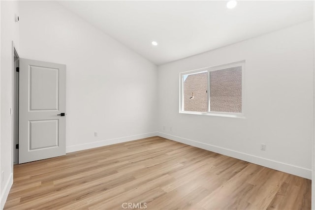 87 Tennessee St Unit C, Redlands, CA 92373 - unfurnished room with baseboards, light wood-style floors, vaulted ceiling, and recessed lighting