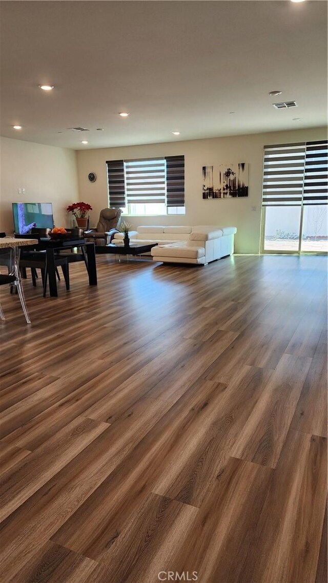 30874 Windy Ridge Way, Menifee, CA 92584 - living area featuring wood finished floors and recessed lighting