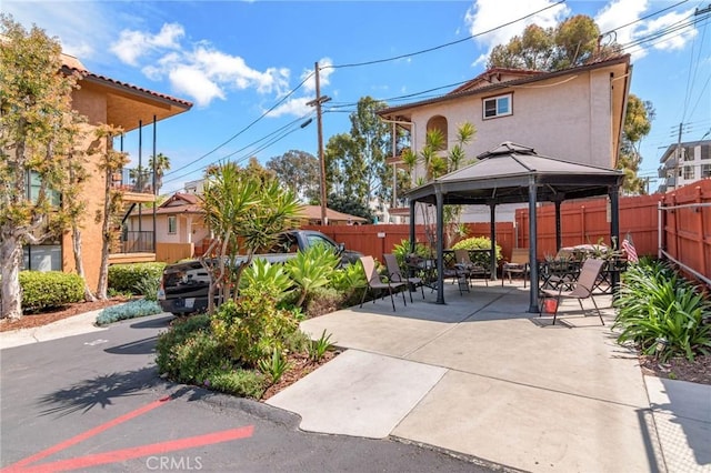 view of patio / terrace featuring a gazebo and a fenced backyard