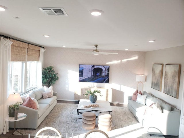 living area with visible vents, baseboards, a ceiling fan, recessed lighting, and wallpapered walls