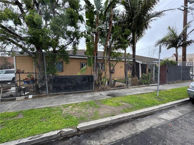 view of front of home with fence