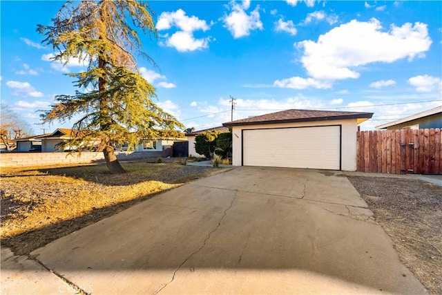 1564 Monte Vista Ave, Rosamond, CA 93560 - ranch-style house featuring stucco siding and a detached garage
