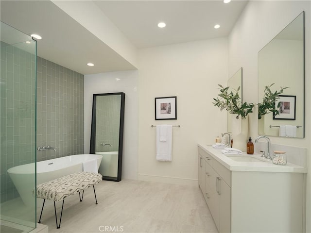 468 Ashton Dr, Laguna Beach, CA 92651 - bathroom with double vanity, a sink, recessed lighting, and a freestanding bath