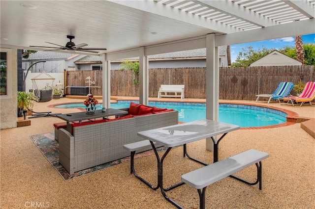 view of swimming pool featuring a fenced backyard, a fenced in pool, a jacuzzi, and a patio