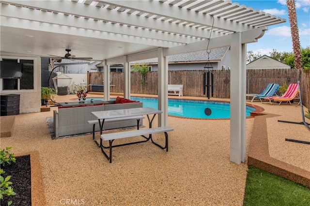 view of swimming pool with a fenced in pool, a fenced backyard, a pergola, and a patio